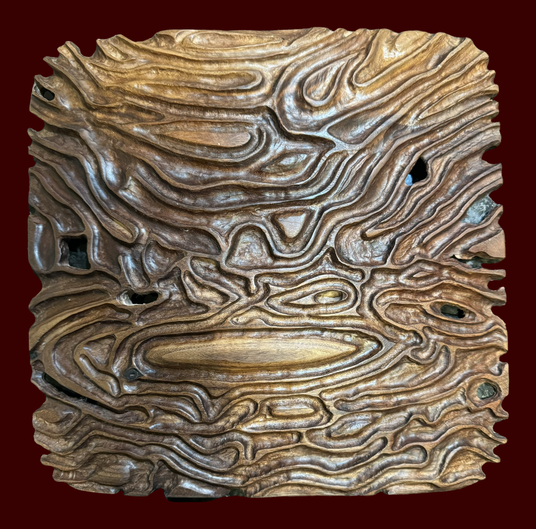 Carved walnut wall art